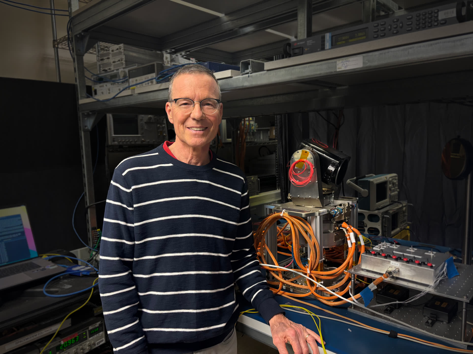 Peter Rossoni working in an optical lab at MIT Lincoln Laboratory (NASA image)