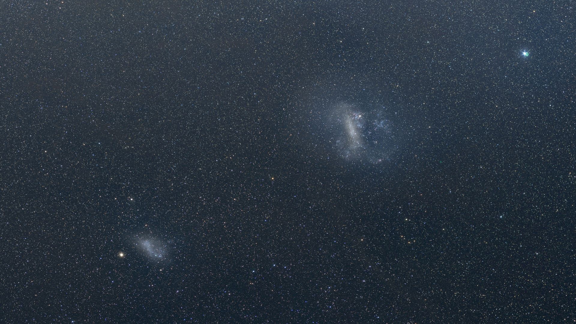 The Large Magellanic Cloud is tearing its smaller neighbor apart, VISTA's 11-year sky survey reveals